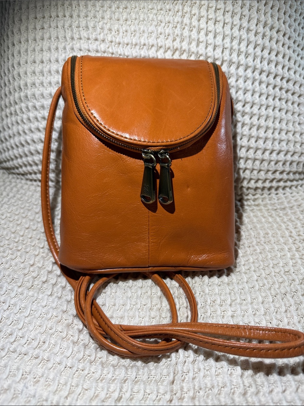 HOBO Cognac Leather Crossbody with Dual Zippers burnt orange color